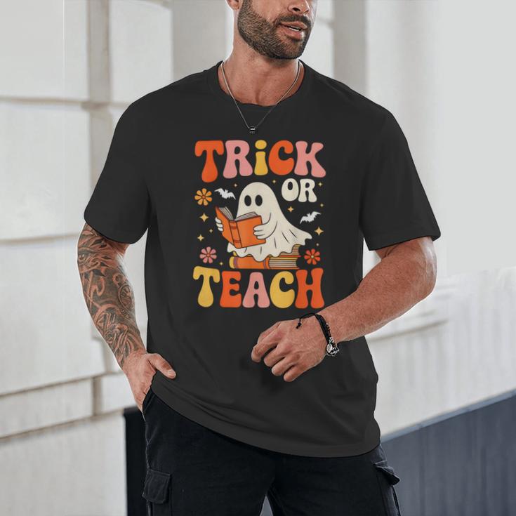 Trick Or Teach Halloween Shirt For Teacher Kids Floral Ghost Unisex T-Shirt, novelty gifts, funny gifts Trick Or Teach Halloween Shirt For Teacher Kids Floral Ghost Unisex T-Shirt, novelty gifts, funny gifts
