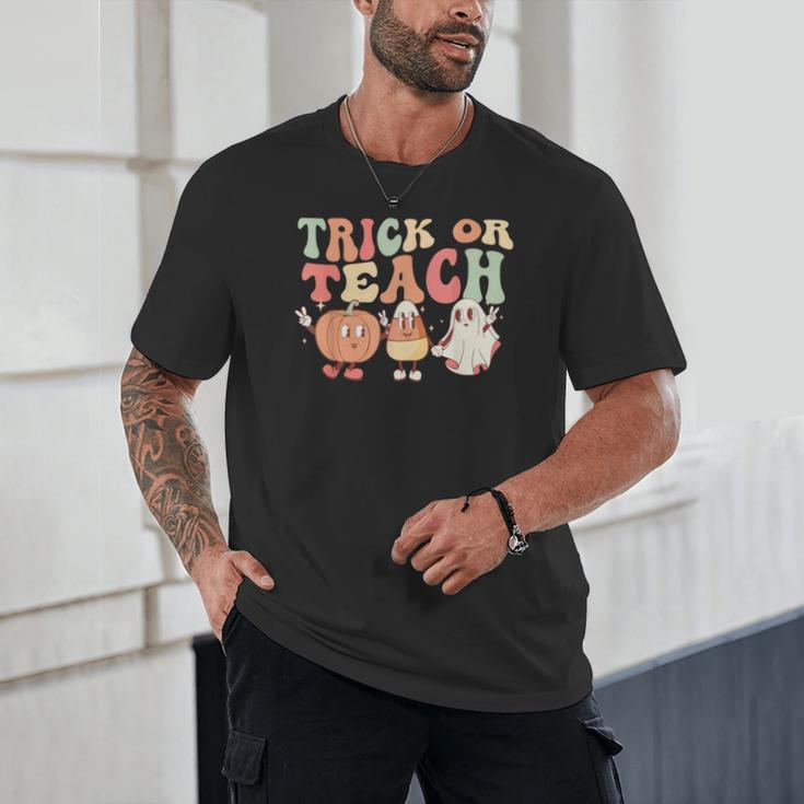 Trick Or Teach Pumpkin Candy Corn Ghost Halloween Teacher Unisex T-Shirt, novelty gifts, funny gifts Trick Or Teach Pumpkin Candy Corn Ghost Halloween Teacher Unisex T-Shirt, novelty gifts, funny gifts