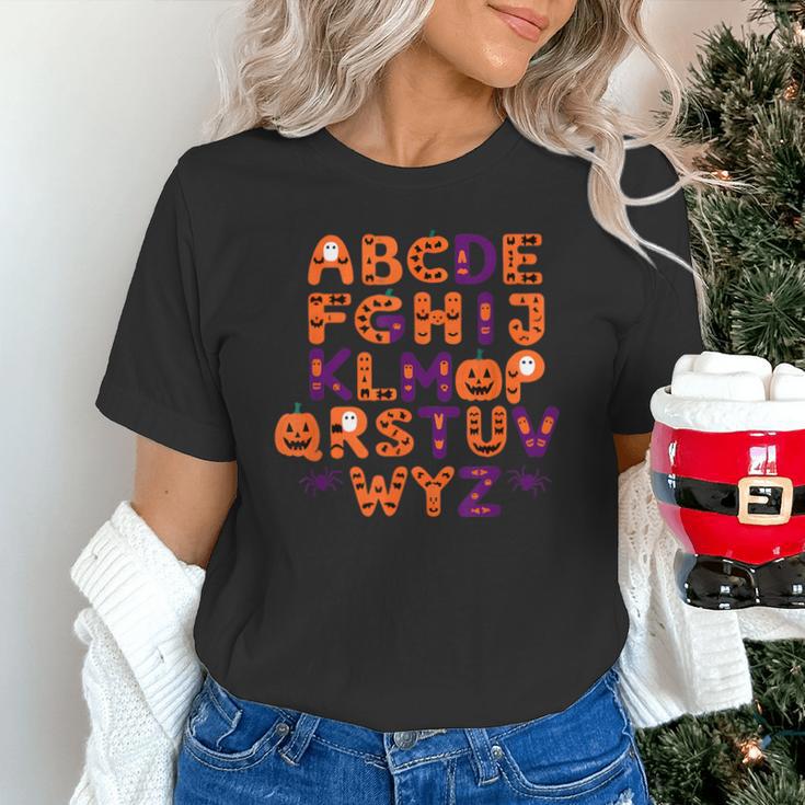 ABCs Learning Kindergarten Teacher Halloween Alphabet Unisex T-Shirt, gift for family, gift for coworker ABCs Learning Kindergarten Teacher Halloween Alphabet Unisex T-Shirt, gift for family, gift for coworker