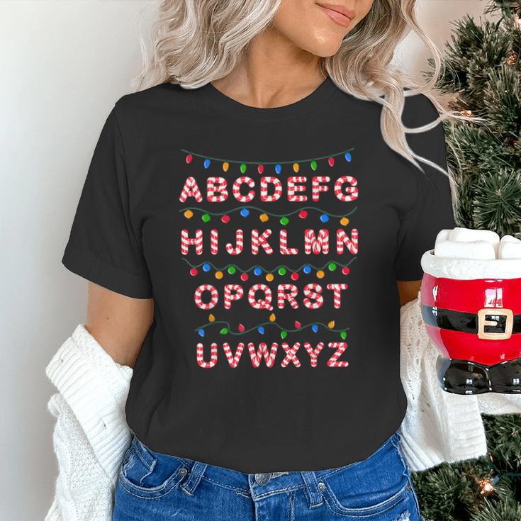 Christmas Alphabet Candy Cane Teachers Students Candy Cane For Men Women Kids Unisex T-Shirt, gift for family, gift for coworker Christmas Alphabet Candy Cane Teachers Students Candy Cane For Men Women Kids Unisex T-Shirt, gift for family, gift for coworker