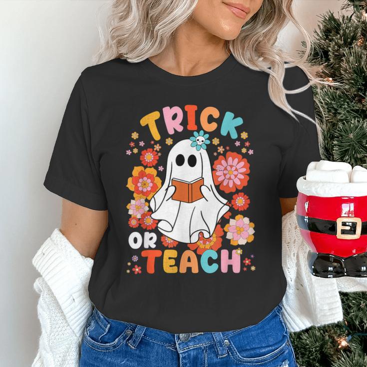 Groovy Halloween Trick Or Teach Retro Floral Ghost Teacher For Men Women Kids Unisex T-Shirt, Groovy Teacher Shirts, gift for family, gift for coworker