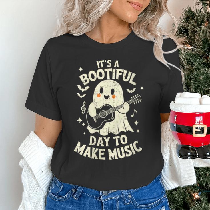 It's A Bootiful Day To Make Music Halloween Music Teacher Unisex T-Shirt, gift for family, gift for coworker It's A Bootiful Day To Make Music Halloween Music Teacher Unisex T-Shirt, gift for family, gift for coworker