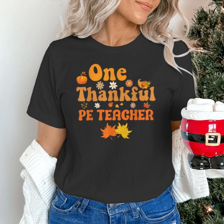 One Thankful PE Teacher Thanksgiving Fall Autumn Groovy Unisex T-Shirt, Groovy Teacher Shirts, Pe Teacher Shirts, gift for family, gift for coworker One Thankful PE Teacher Thanksgiving Fall Autumn Groovy Unisex T-Shirt, Groovy Teacher Shirts, Pe Teacher Shirts, gift for family, gift for coworker