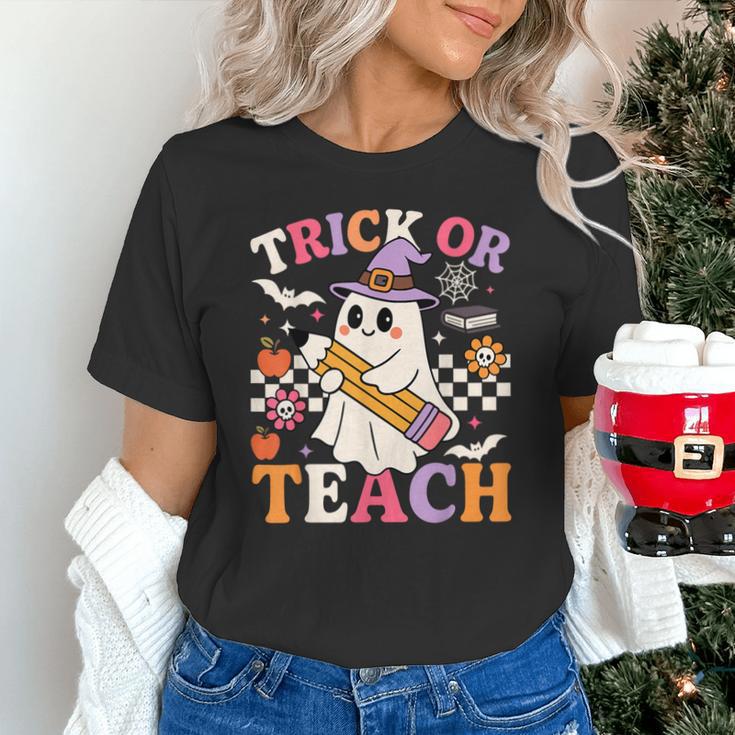 Retro Floral Ghost Trick Or Teach Groovy Teacher Halloween Unisex T-Shirt, Groovy Teacher Shirts, gift for family, gift for coworker