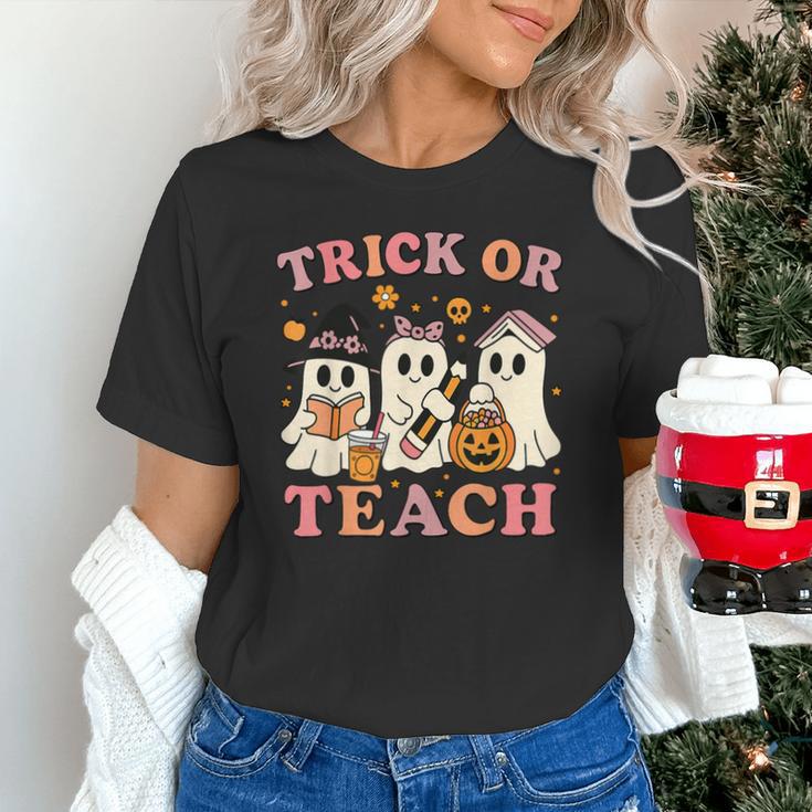 Teacher Halloween Trick Or Teach Cute Ghost Coffee Pumpkins Unisex T-Shirt, gift for family, gift for coworker Teacher Halloween Trick Or Teach Cute Ghost Coffee Pumpkins Unisex T-Shirt, gift for family, gift for coworker