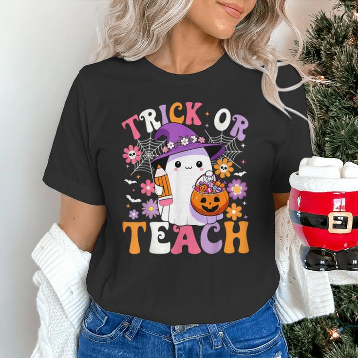 Trick Or Teach Groovy Teacher Ghost Halloween Teacher Unisex T-Shirt, Groovy Teacher Shirts, gift for family, gift for coworker