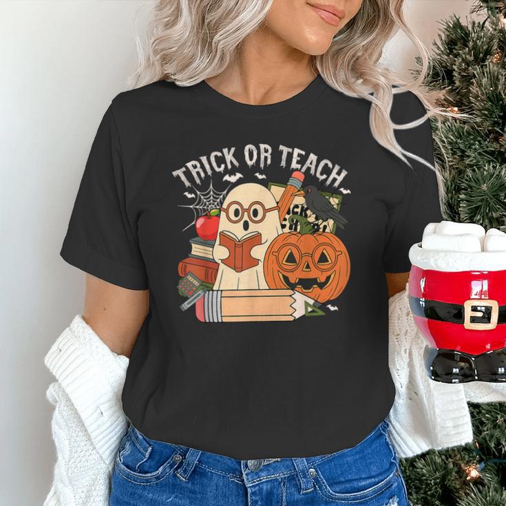 Trick Or Teach Retro Halloween Teacher Women Men Costume Unisex T-Shirt, gift for family, gift for coworker Trick Or Teach Retro Halloween Teacher Women Men Costume Unisex T-Shirt, gift for family, gift for coworker
