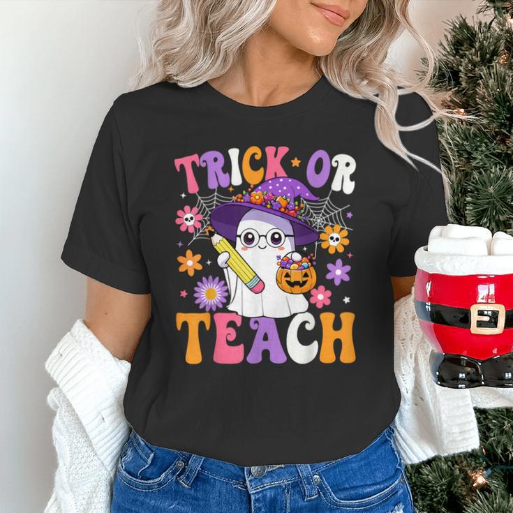 Trick Or Teach Teacher Ghost Teaching Fun Halloween Teacher Unisex T-Shirt, gift for family, gift for coworker Trick Or Teach Teacher Ghost Teaching Fun Halloween Teacher Unisex T-Shirt, gift for family, gift for coworker