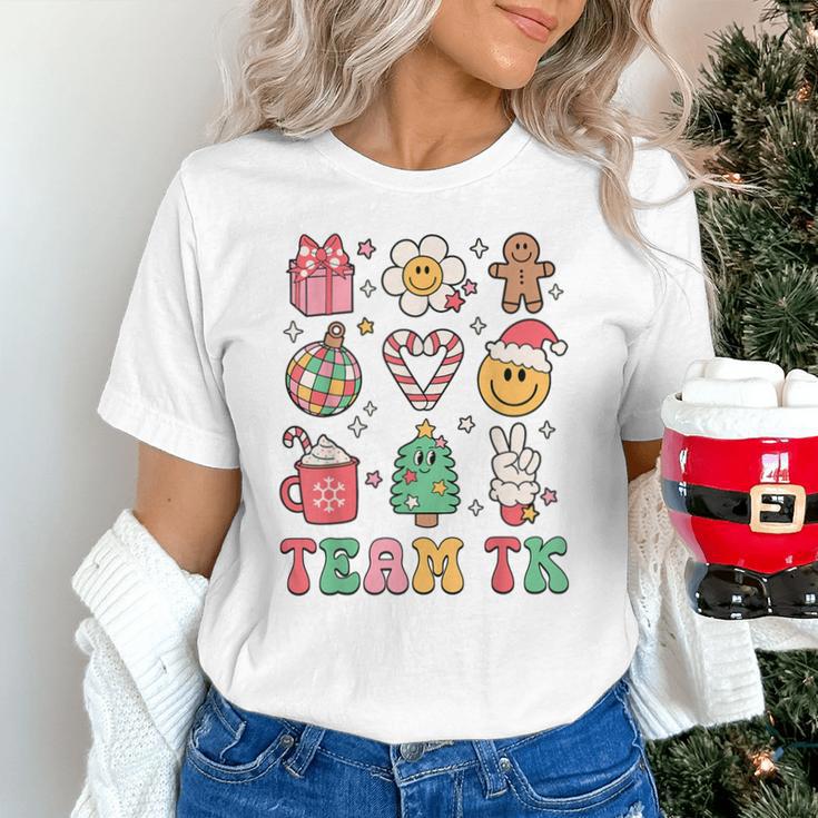 Team TK Teacher Christmas Groovy Smile Face Girl Boy Kid TK Unisex T-Shirt, Groovy Teacher Shirts, gift for family, gift for coworker Team TK Teacher Christmas Groovy Smile Face Girl Boy Kid TK Unisex T-Shirt, Groovy Teacher Shirts, gift for family, gift for coworker