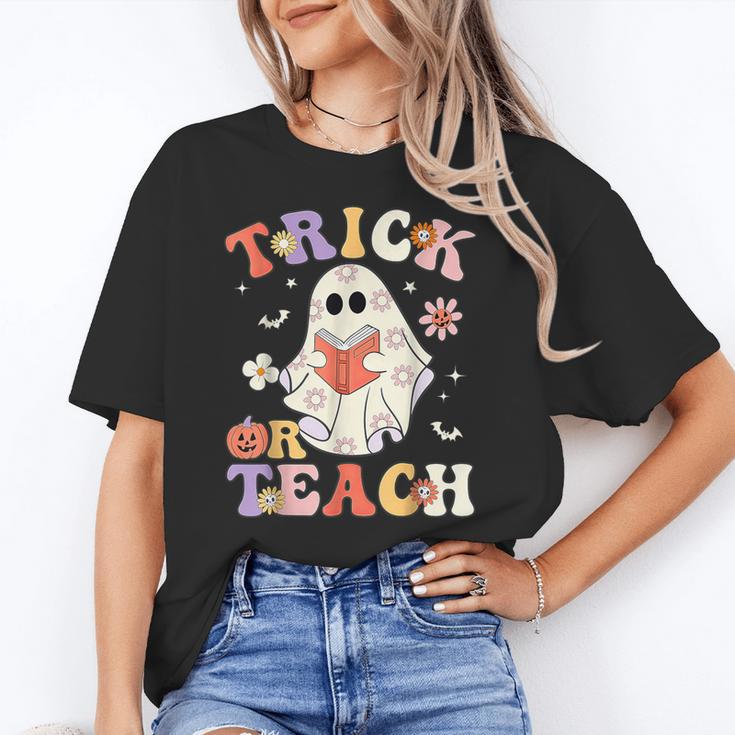 Groovy Halloween Trick Or Teach Retro Floral Ghost Teacher Women's T-Shirt