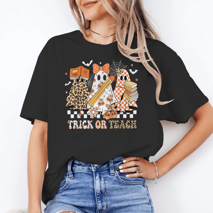 Trick Or Teach Groovy Teacher Halloween Floral Ghost Women's T-Shirt, Groovy Teacher Gifts, trending gift Trick Or Teach Groovy Teacher Halloween Floral Ghost Women's T-Shirt, Groovy Teacher Gifts, trending gift