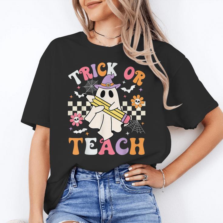 Trick Or Teach Groovy Teacher Halloween Retro Teacher Ghost Women's T-Shirt