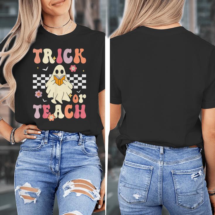 Groovy Teacher Halloween Retro Trick Or Teach Floral Ghost Women's T-Shirt, Groovy Teacher Gifts, funny design