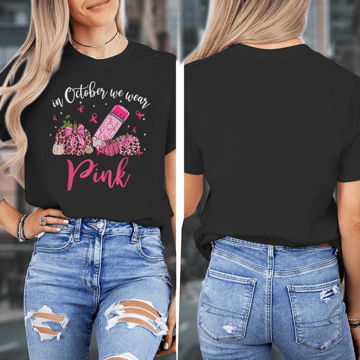 In October We Wear Pink Apple Teacher Daisy Breast Cancer Women's T-Shirt, funny design