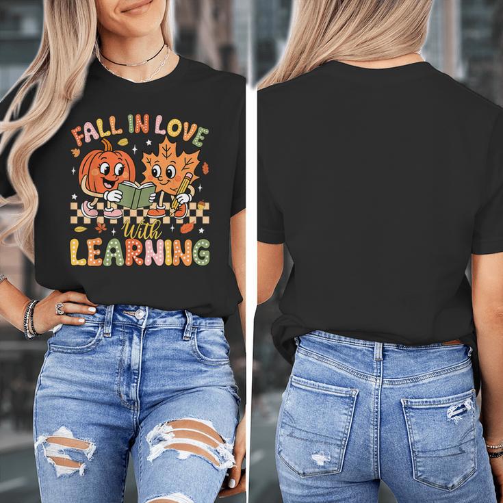 Retro Fall In Love With Learning Autumn Pumpkin Teacher Kids Women's T-Shirt, funny design