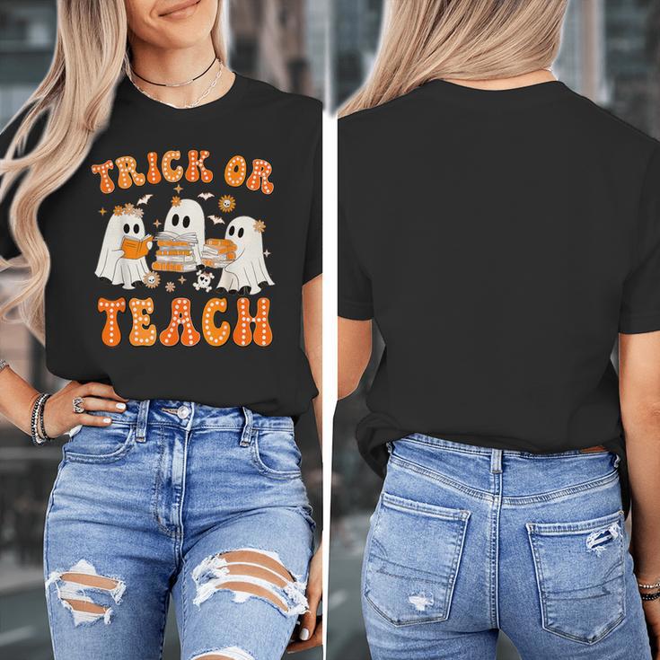 Teacher Halloween Trick Or Teach Retro Groovy Floral Ghost Women's T-Shirt, Groovy Teacher Gifts, funny design Teacher Halloween Trick Or Teach Retro Groovy Floral Ghost Women's T-Shirt, Groovy Teacher Gifts, funny design