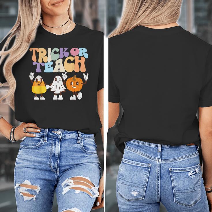 Trick Or Teach Cute Halloween Teacher Women's T-Shirt, funny design