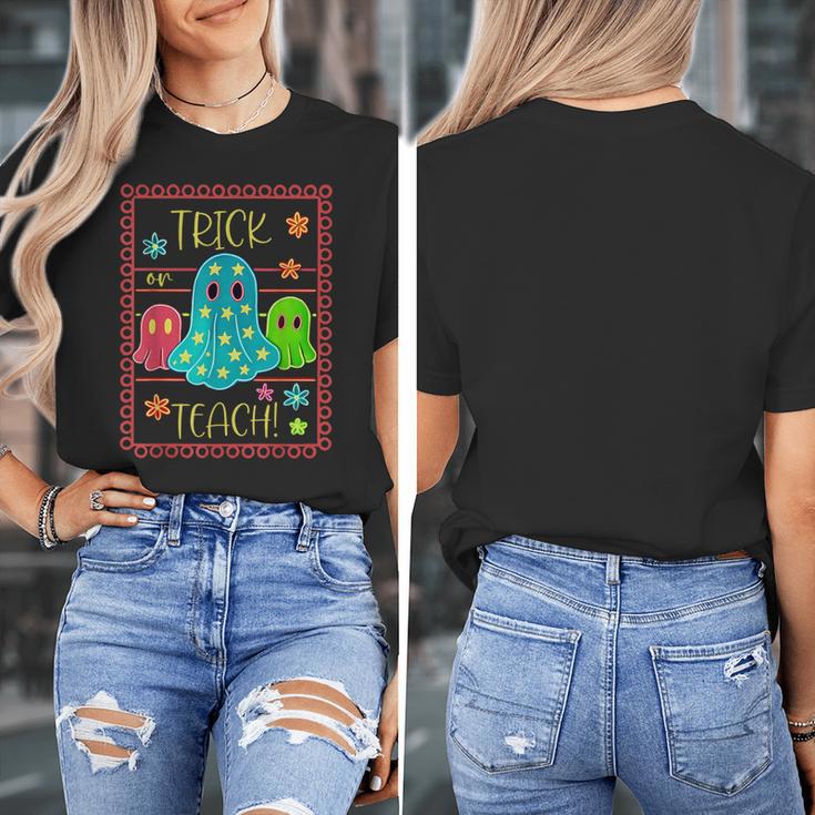 Trick Or Teach Neon Ghost Flower Teacher Spooky Halloween Women's T-Shirt, funny design