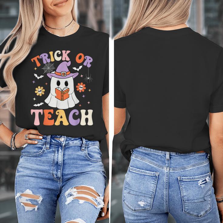 Trick Or Teach Teacher Groovy Ghost Halloween Teacher Women's T-Shirt, Groovy Teacher Gifts, funny design Trick Or Teach Teacher Groovy Ghost Halloween Teacher Women's T-Shirt, Groovy Teacher Gifts, funny design