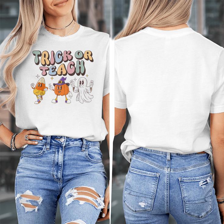 Trick Or Teach Candy Corn Pumpkin Ghost Teacher Women's T-Shirt, funny design Trick Or Teach Candy Corn Pumpkin Ghost Teacher Women's T-Shirt, funny design