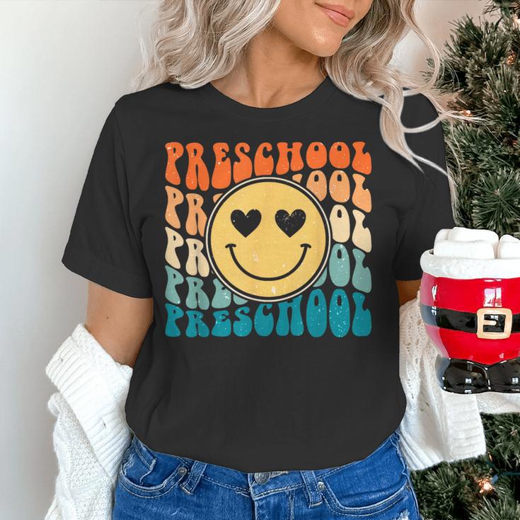 Back To School Groovy Smile Preschool Teachers Students Kids Women's T-Shirt, gift for family, gift for coworker Back To School Groovy Smile Preschool Teachers Students Kids Women's T-Shirt, gift for family, gift for coworker
