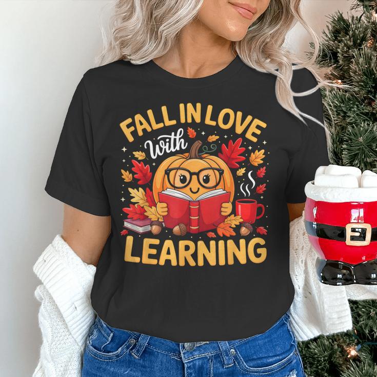 Fall In Love With Learning Pumpkin Thanksgiving Teacher Fall Women's T-Shirt, gift for family, gift for coworker