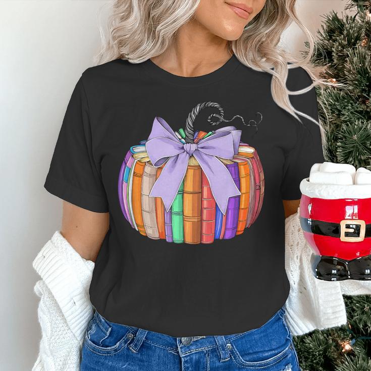 Fall Pumpkin Books Lover Halloween Teacher Teaching Staff Women's T-Shirt, gift for family, gift for coworker