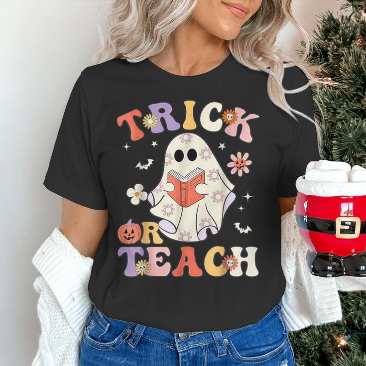 Groovy Halloween Trick Or Teach Retro Floral Ghost Teacher Women's T-Shirt, Groovy Teacher Shirts, gift for family, gift for coworker Groovy Halloween Trick Or Teach Retro Floral Ghost Teacher Women's T-Shirt, Groovy Teacher Shirts, gift for family, gift for coworker