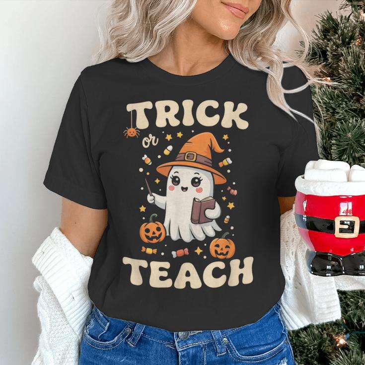 Halloween Teacher Shirts Women School Trick Or Teach Groovy Women's T-Shirt, Groovy Teacher Shirts, gift for family, gift for coworker