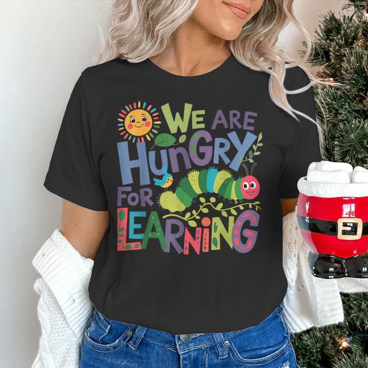We Are Hungry For Learning Teacher Life Back To School Women's T-Shirt, gift for family, gift for coworker We Are Hungry For Learning Teacher Life Back To School Women's T-Shirt, gift for family, gift for coworker