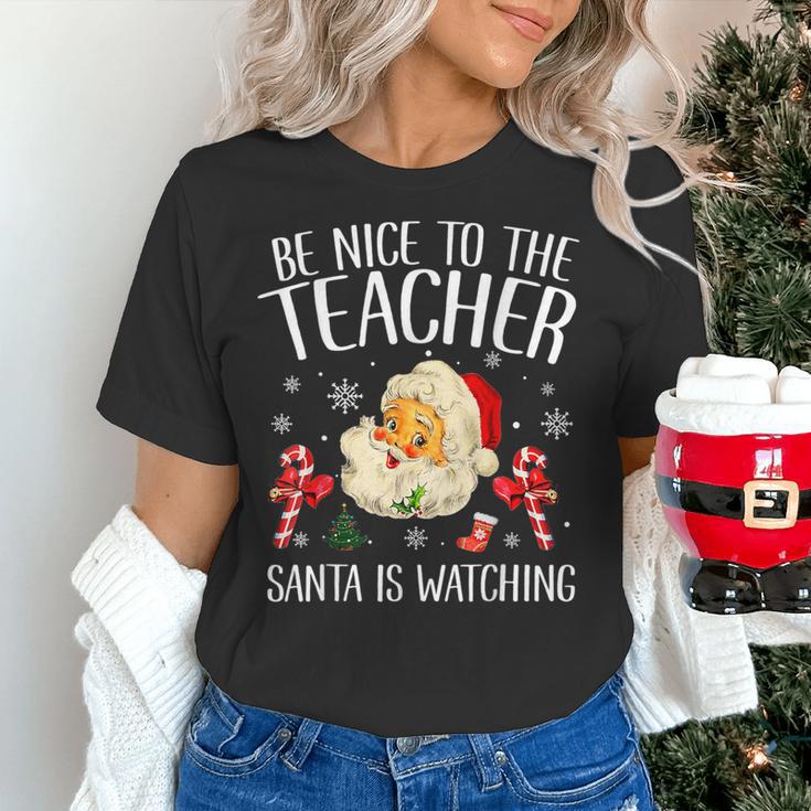 Be Nice To The Teacher Santa Is Watching School Christmas Women's T-Shirt, gift for family, gift for coworker