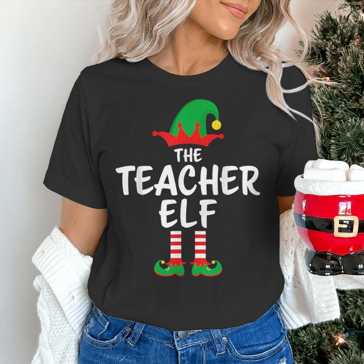 The Teacher Elf Matching Family Christmas Women's T-Shirt, gift for family, gift for coworker The Teacher Elf Matching Family Christmas Women's T-Shirt, gift for family, gift for coworker