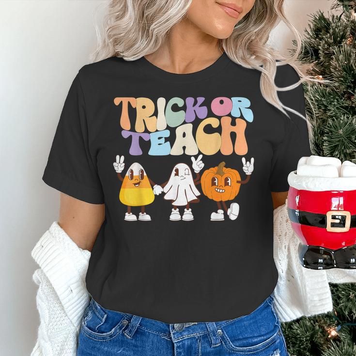 Trick Or Teach Cute Halloween Teacher Women's T-Shirt, gift for family, gift for coworker
