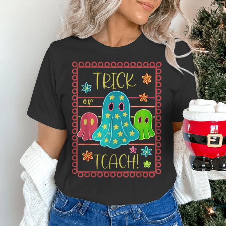 Trick Or Teach Neon Ghost Flower Teacher Spooky Halloween Women's T-Shirt, gift for family, gift for coworker