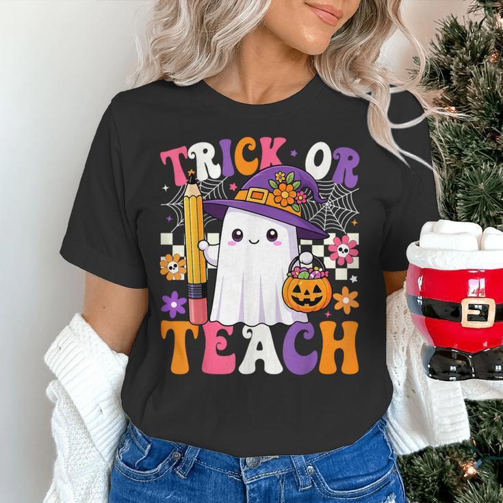 Trick Or Teach Teacher Pencil Ghost Halloween Teacher Women's T-Shirt, gift for family, gift for coworker Trick Or Teach Teacher Pencil Ghost Halloween Teacher Women's T-Shirt, gift for family, gift for coworker