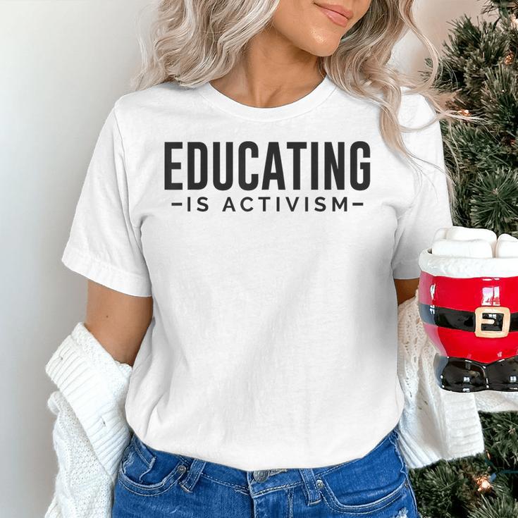 Educating Is Activism Feminist Social Justice Teacher For Men Women Women's T-Shirt, gift for family, gift for coworker
