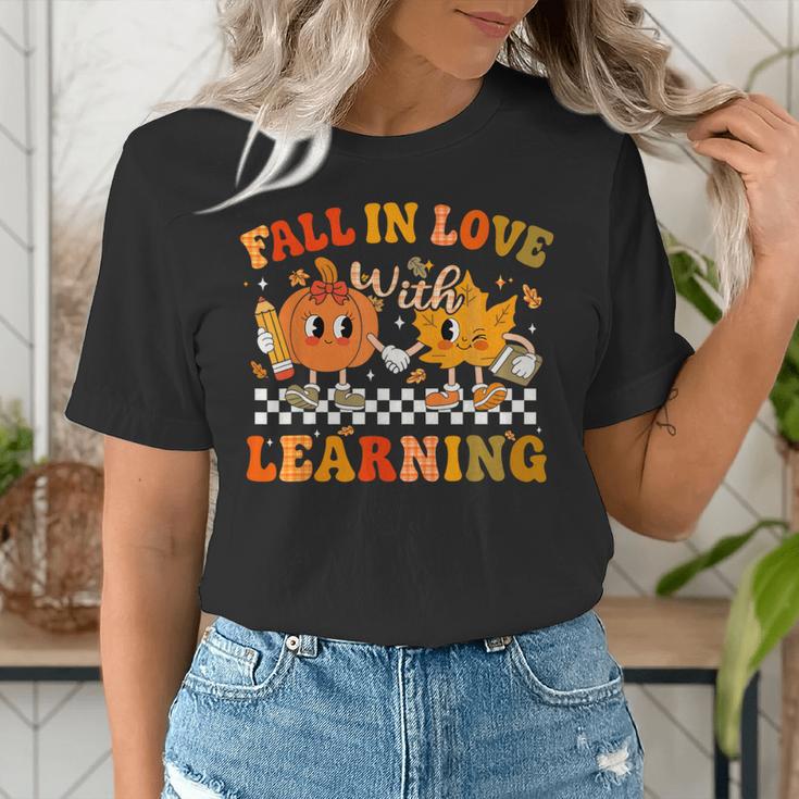 Fall In Love With Learning Autumn Pumpkin Fall Teacher Kids Women's T-Shirt, funny gift