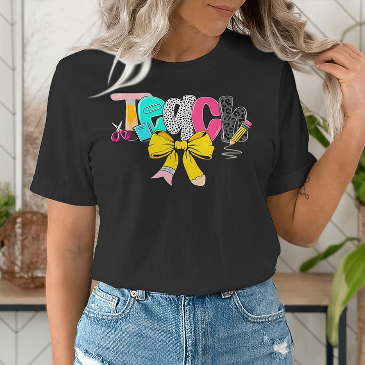 Teach Coquette Bow Teacher Back To School Happy First Day Women's T-Shirt, funny gift