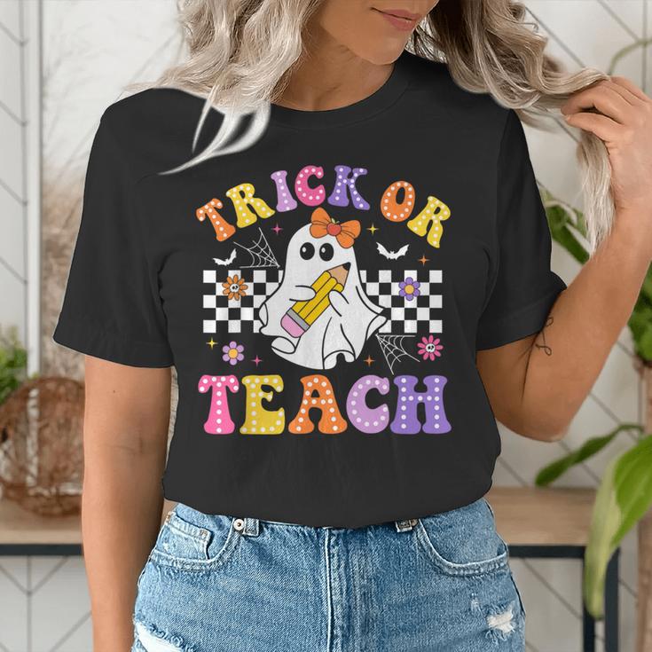Trick Or Teach Groovy Halloween Teachers Women's T-Shirt, funny gift Trick Or Teach Groovy Halloween Teachers Women's T-Shirt, funny gift