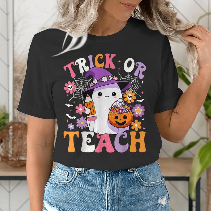 Trick Or Teach Groovy Teacher Ghost Halloween Teacher Women's T-Shirt, Groovy Teacher Shirts, funny gift