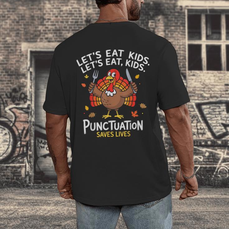 Lets Eat Kids Punctuation Saves Lives Thanksgiving Teacher Men's Back Print T-Shirt, funny design