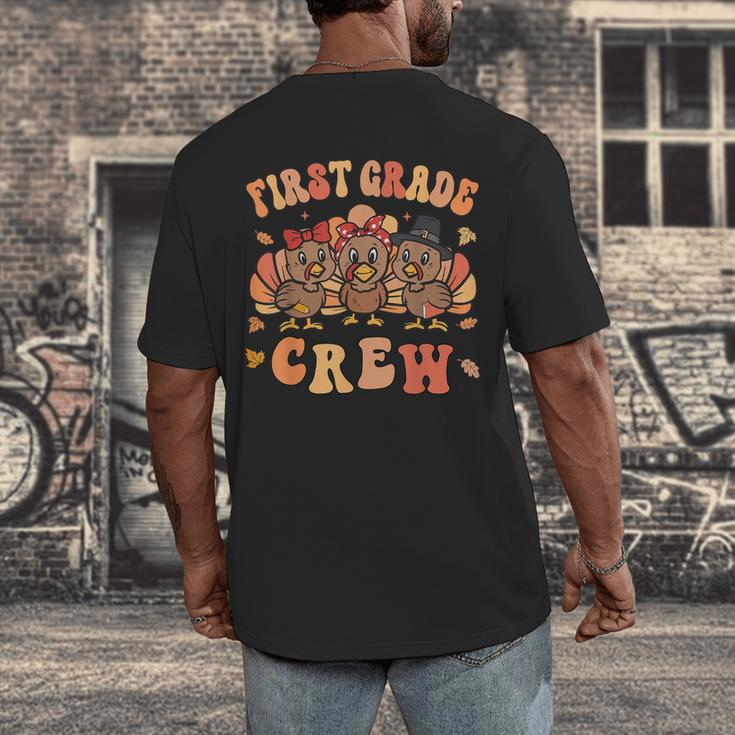 First Grade Crew Thanksgiving Fall Teacher 1st Grade Team Men's Back Print T-Shirt, funny design