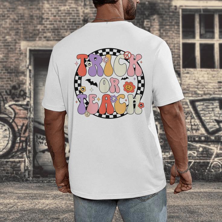 Trick Or Teach Retro Groovy Halloween Teacher Men's Back Print T-Shirt, funny design Trick Or Teach Retro Groovy Halloween Teacher Men's Back Print T-Shirt, funny design