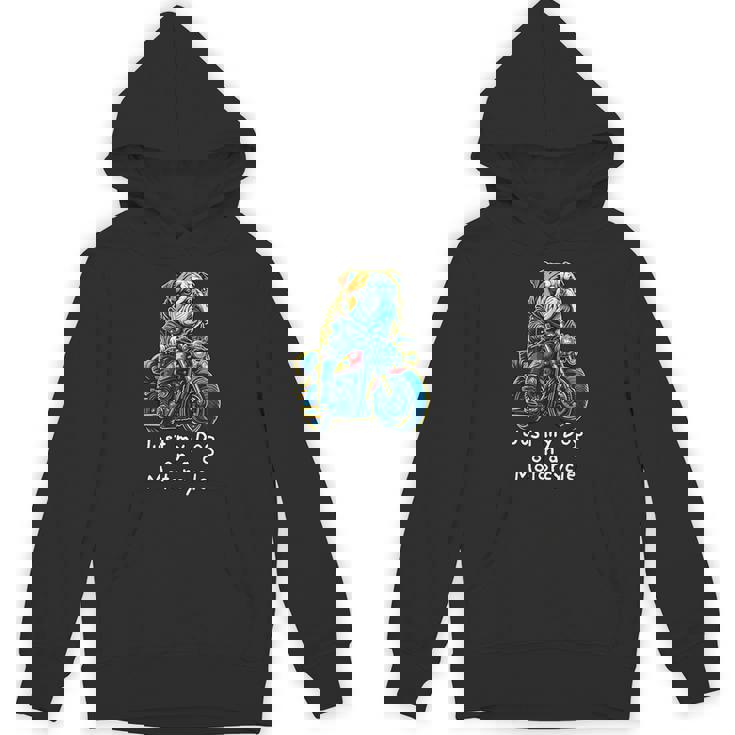 クリスマスのバイクに乗るかわいいイングリッシュブルドッグ。 パーカー