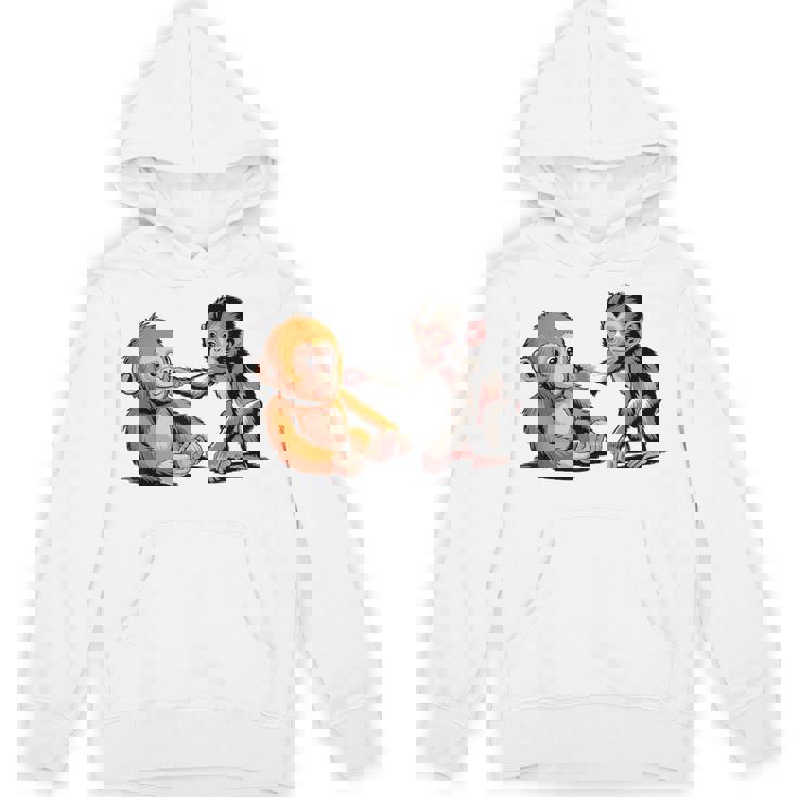 オレンジのおもちゃで悲しい猿のパンチ パーカー