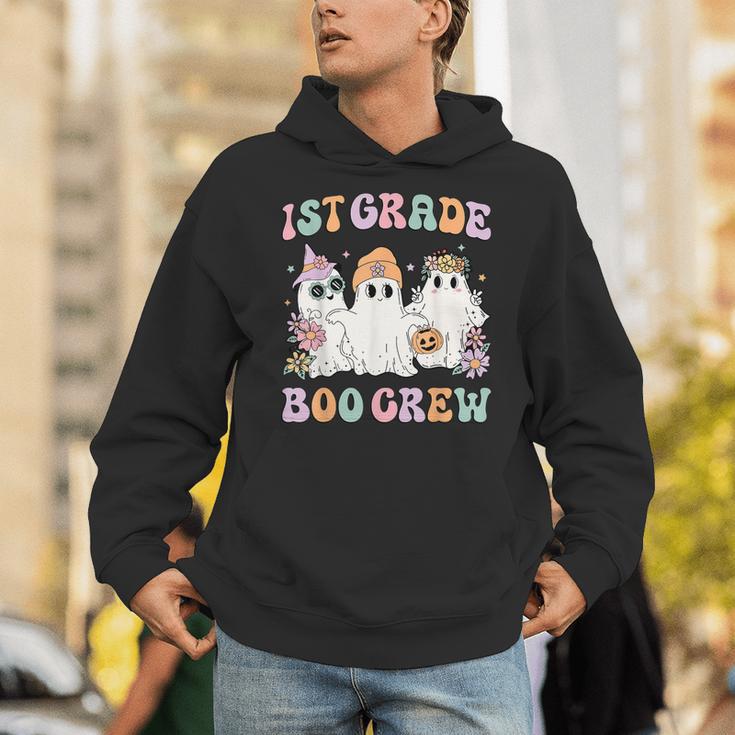 1st Grade Boo Crew Groovy Halloween Floral Ghost Kid Teacher Unisex Hoodie, Groovy Teacher Hoodies, funny gift