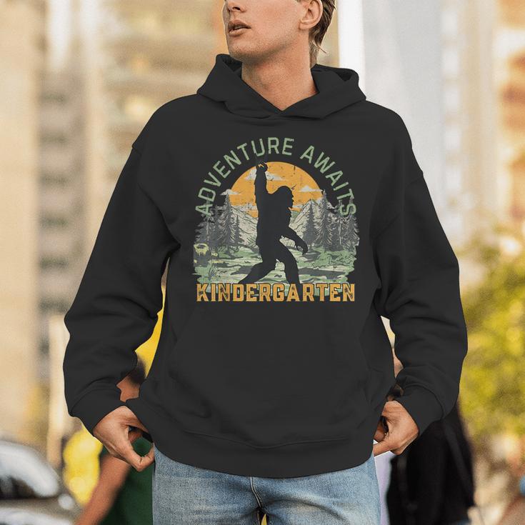 Adventure Awaits Bigfoot Teacher Kindergarten Back To School Unisex Hoodie, funny gift Adventure Awaits Bigfoot Teacher Kindergarten Back To School Unisex Hoodie, funny gift