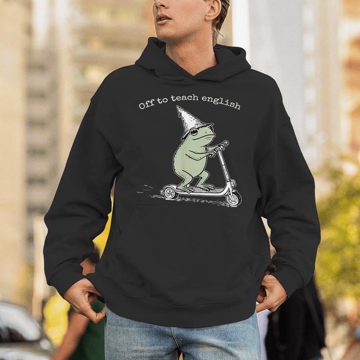 Off To Teach English Scooter Frog ESL Teacher Literature Unisex Hoodie, Esl Teacher Hoodies, English Teacher Hoodies, funny gift Off To Teach English Scooter Frog ESL Teacher Literature Unisex Hoodie, Esl Teacher Hoodies, English Teacher Hoodies, funny gift