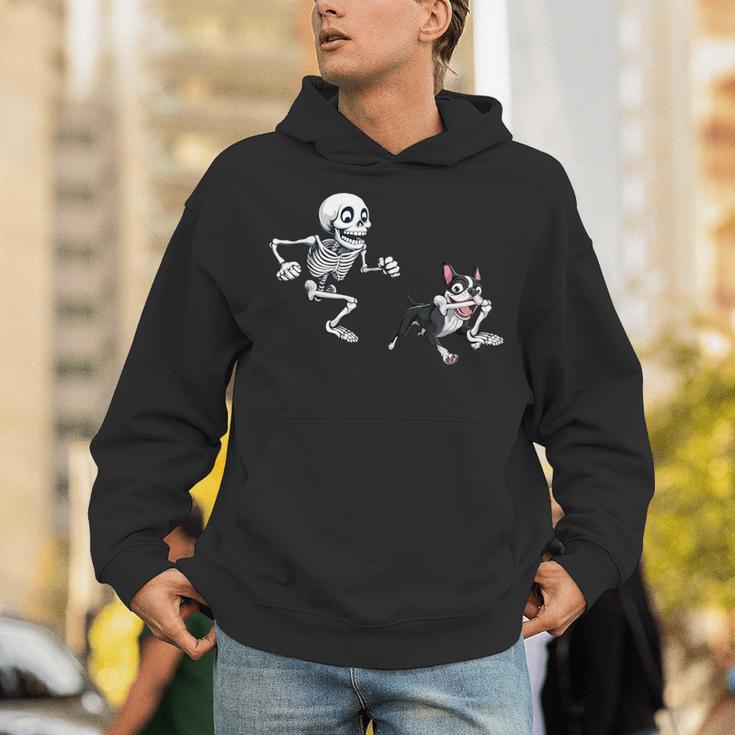 Skeleton Chasing Dog Boston Terrier Halloween Pet Lover Unisex Hoodie, Boston Terrier Halloween Hoodies, funny gift