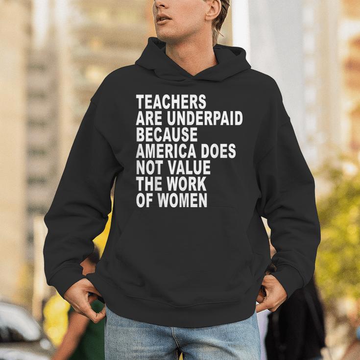 Teachers Are Underpaid Because America Does Not Value Men Women Unisex Hoodie, funny gift Teachers Are Underpaid Because America Does Not Value Men Women Unisex Hoodie, funny gift